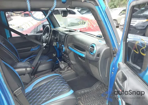 2015 Jeep Wrangler Unlimited Freedom Edition из США, поврежденный, VIN 1C4BJWDG4FL568470